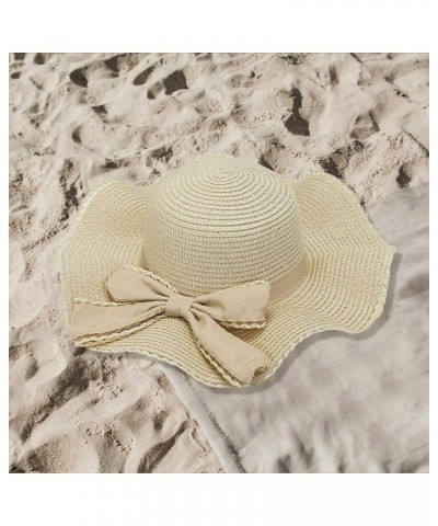 Women's Wide Brimmed Sun Straw Hats with Bowtie Flower Accessories Summer Soft Beach Hat Light-Weight Visors Beige $8.99 Buck...